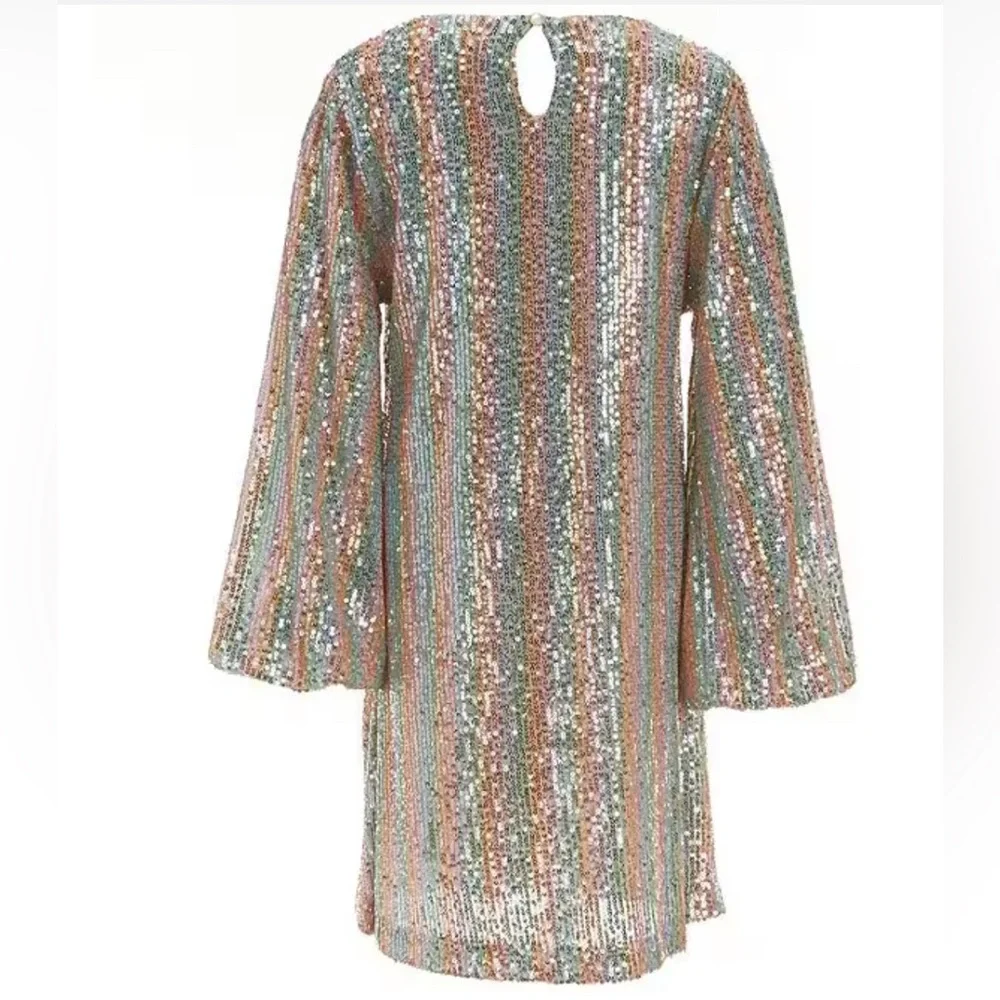 This kids dress is so beautiful! The sequins give it such a glamorous look. - Picture 4 of 10